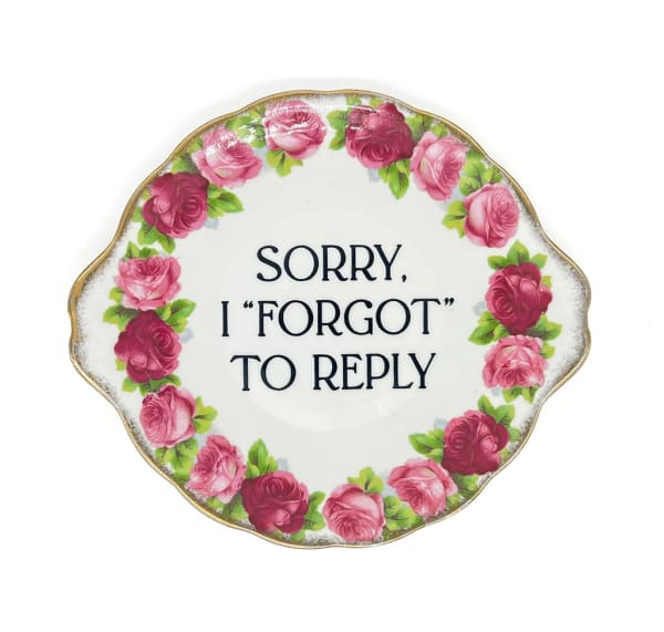 ceramic plates with words painted on them