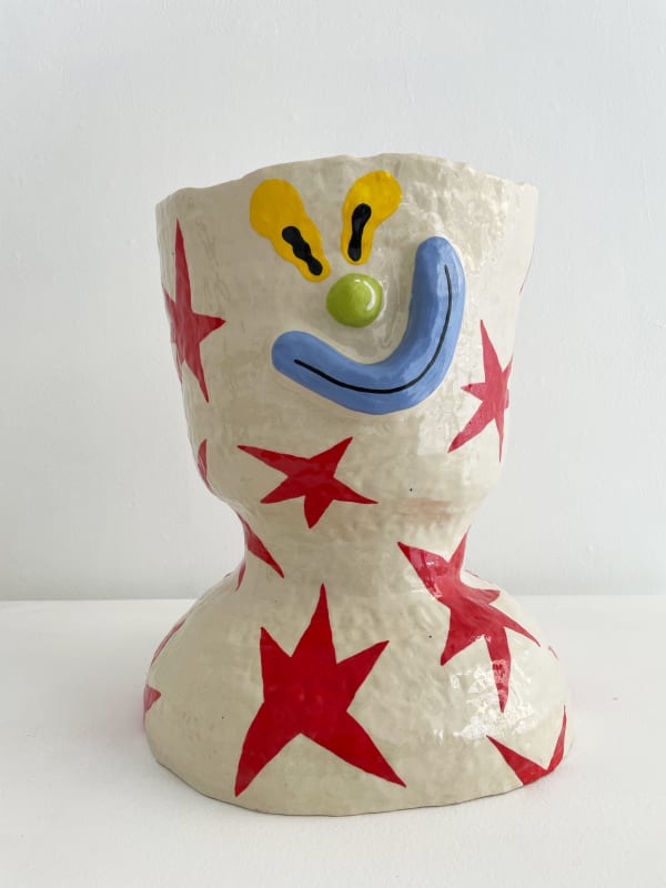 Christopher Gale large vase with a face and red stars all over