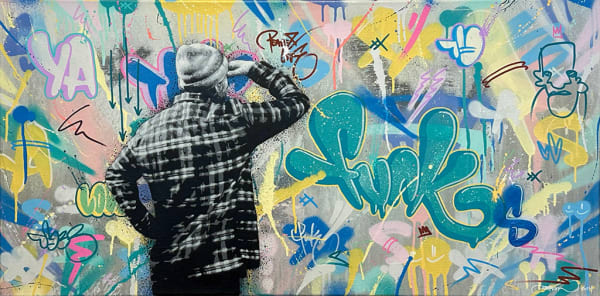 black and white man in a flannel in front of a pastel graffiti wall