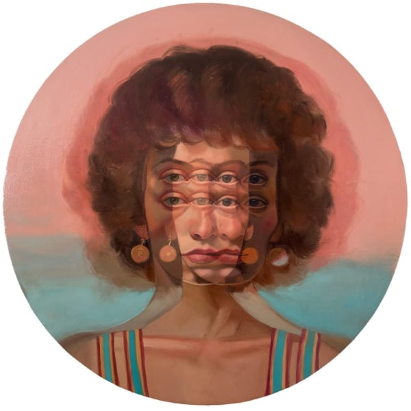 Portrait of a woman's face overlapping itself