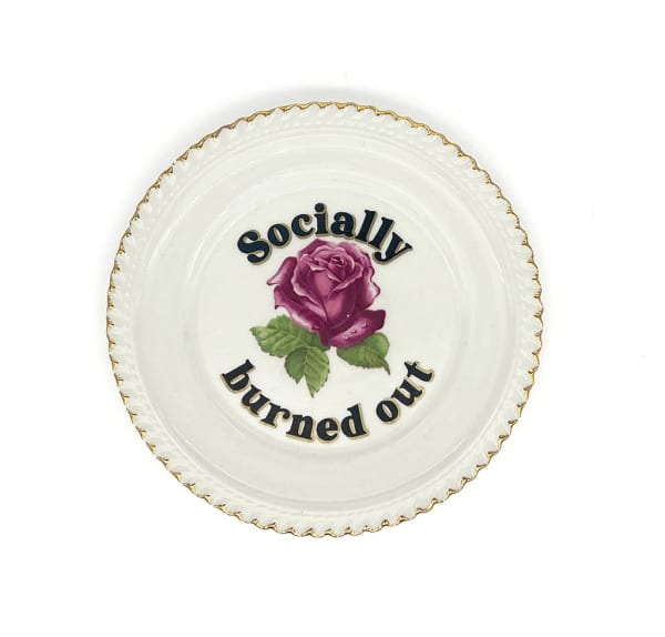 ceramic plates with words painted on them