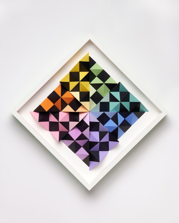 wooden wall sculpture with rainbow colors