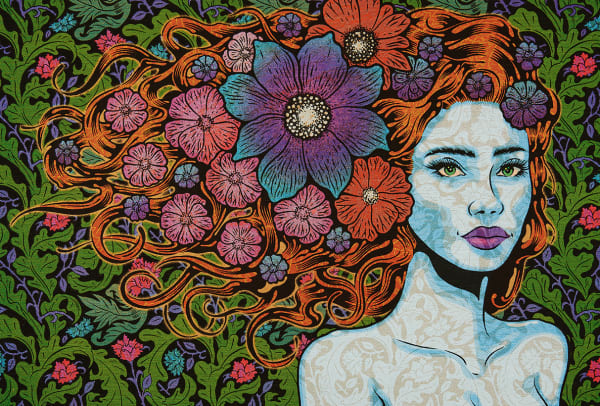 blue woman with flowers in her hair blowing back onto a green background