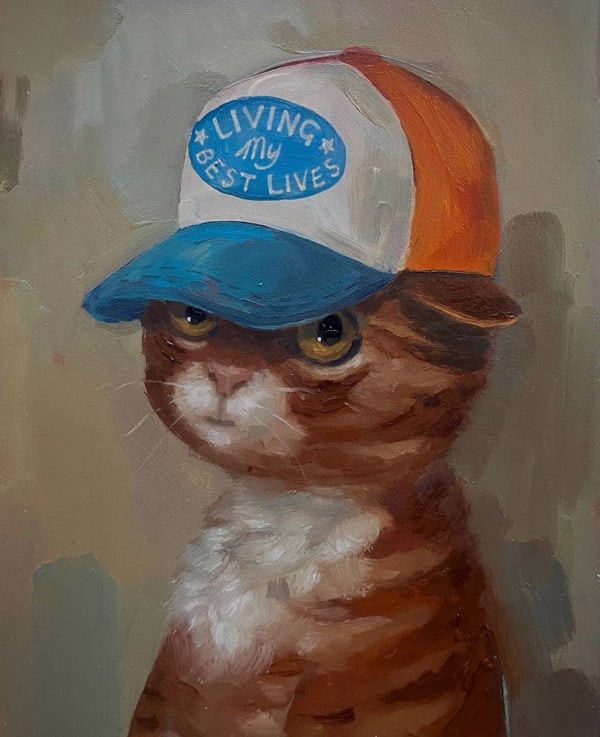 Painting of an orange cat wearing a blue, white and orange baseball cap with the words LIVING MY BEST LIVES written on it in front of a gray background