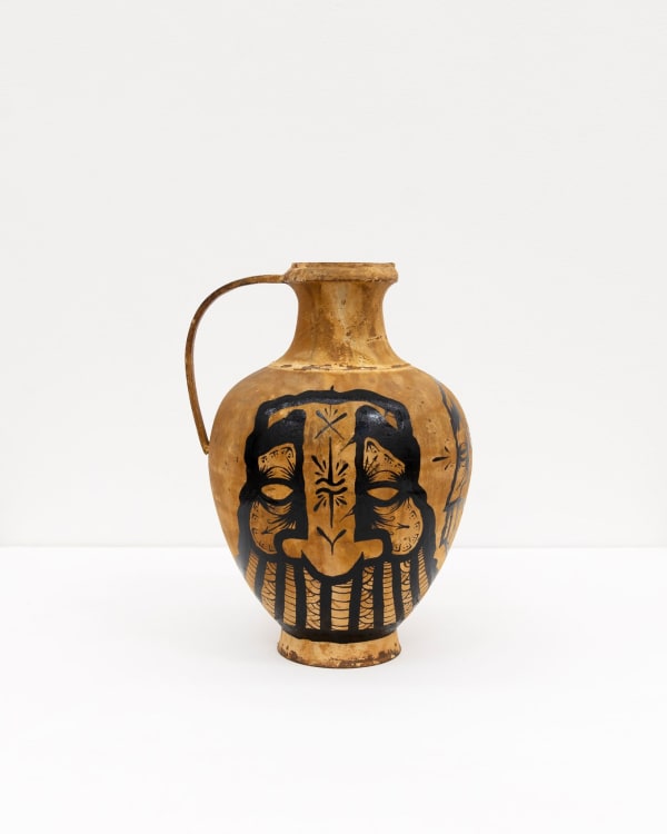 GATS character painted on a metal brown vase in black