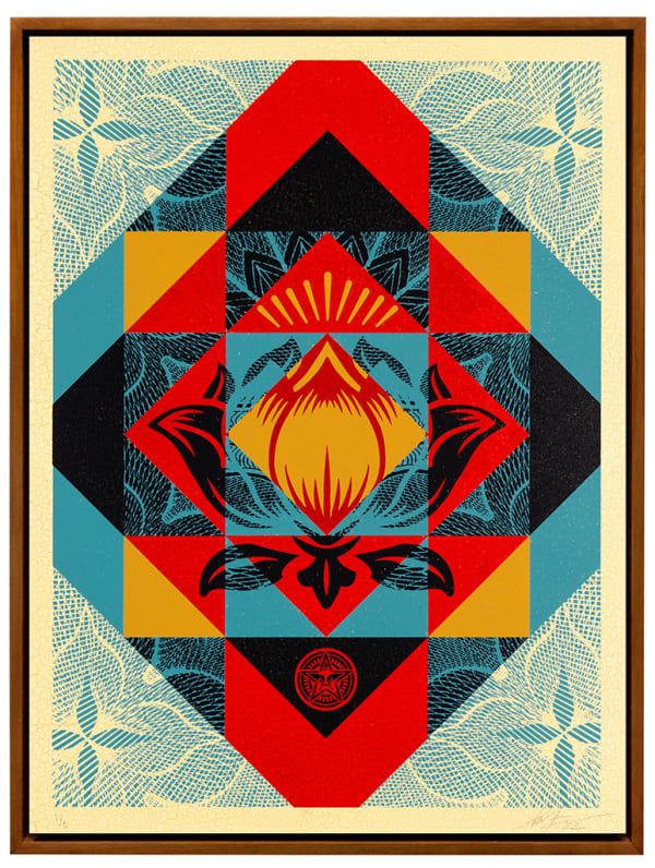 abstracted image of a lotus flower with geometric diamond with blue, red, and yellow panels