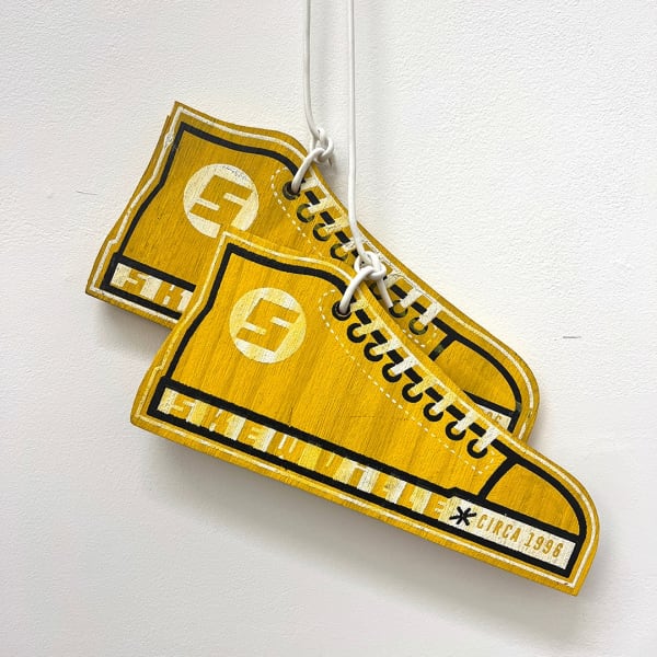 Skewville Yellow Dogs, 2016 silkscreen on wood with cord 5 x 10.5 in each shoe