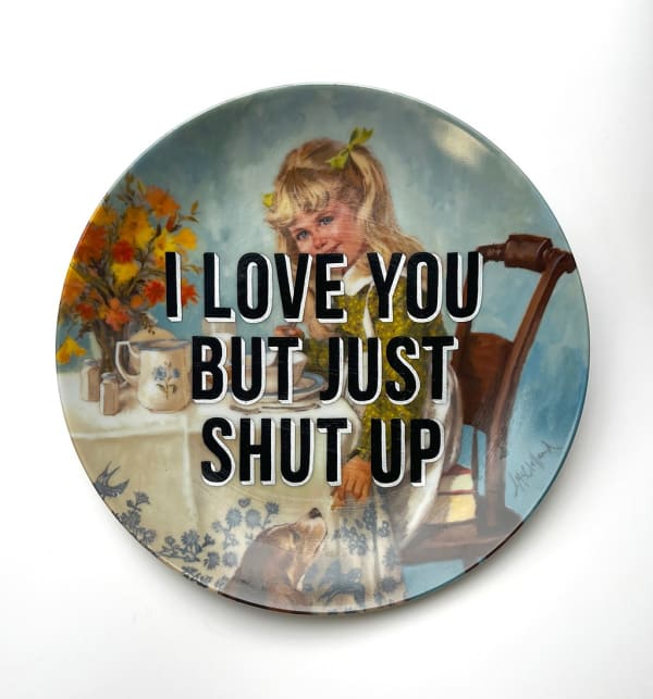 ceramic plates with words painted on them