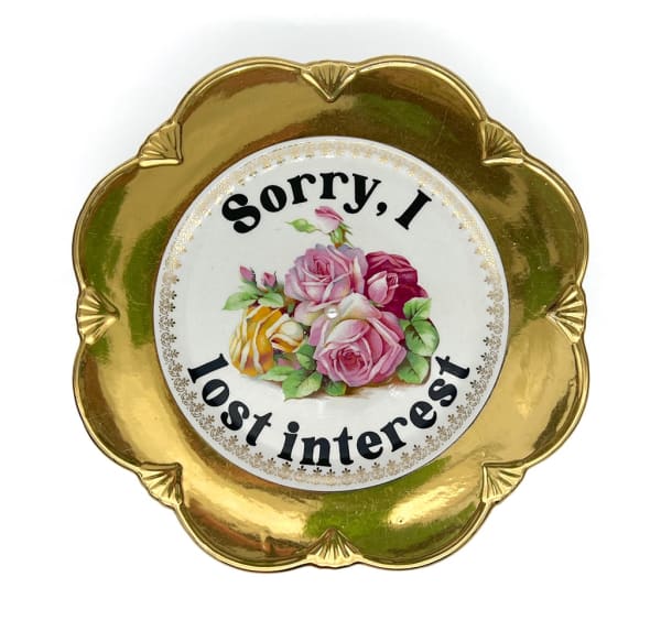 ceramic plates with words painted on them