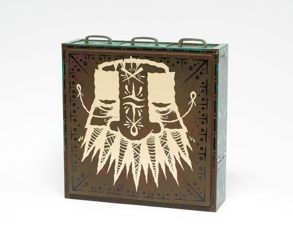 vintage filing cabinet adorned with designs of a geometric figured