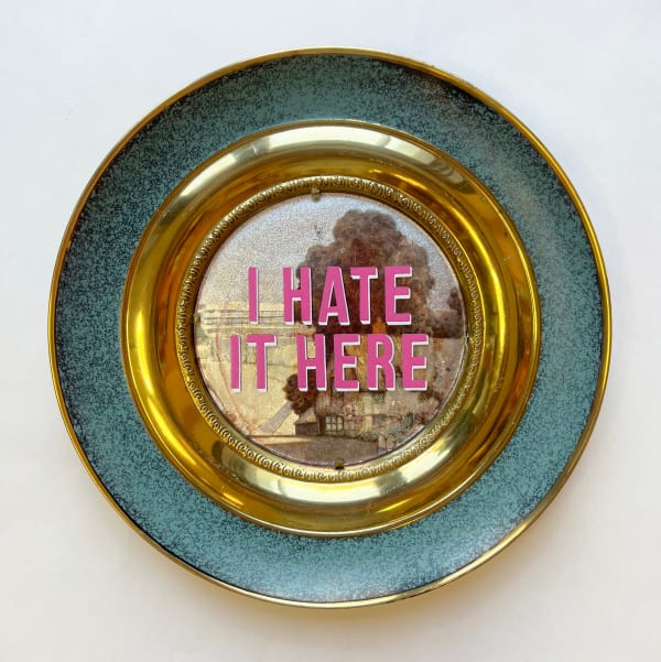 Plate reading "I Hate It Here"