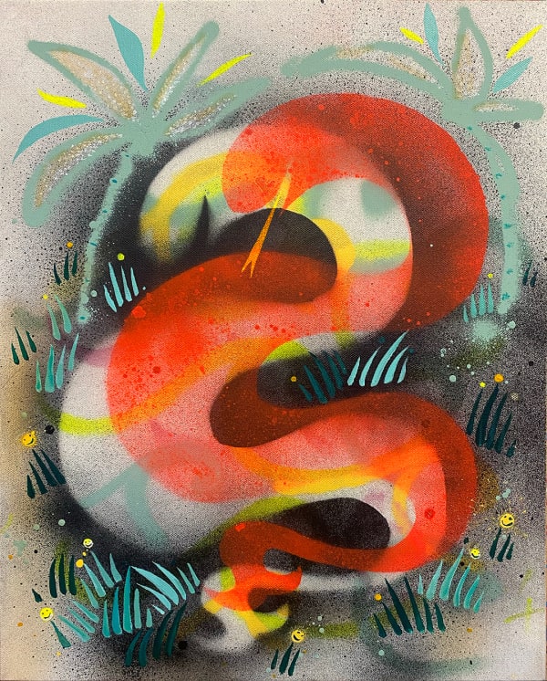 white and red snake layered over one another