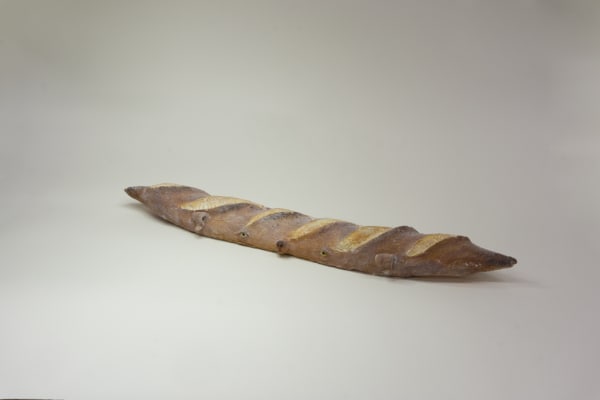 Stephen Morrison "Baguette" ceramic sculpture of realistic baguette with human eyes and nose