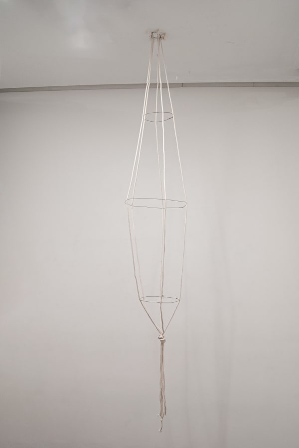 Rope and wire vessel hanging from ceiling