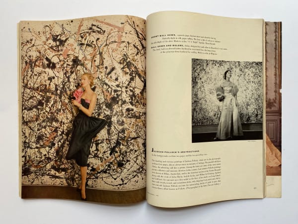 Open magazine with models photographed by Cecil Beaton for Vogue with brief text