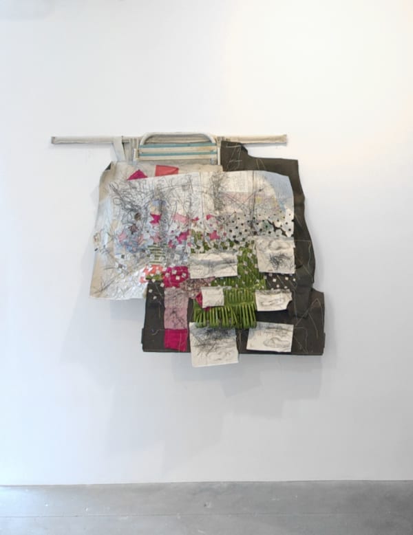 Hanging sculpture comprised of beach chair parts, canvas, car trunk parts, colored pencil, fabric, gesso, graphite, hardware, maps, paper, PVA adhesive, thread, wood