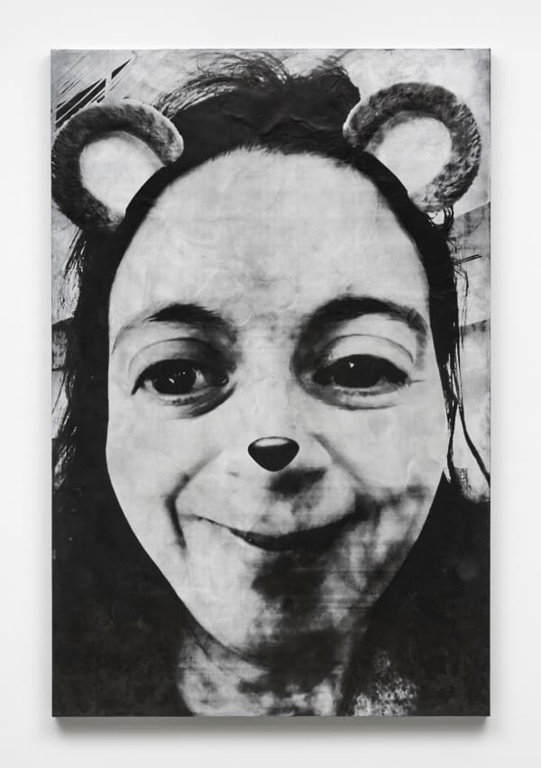 a selfie with animal features on a white wall