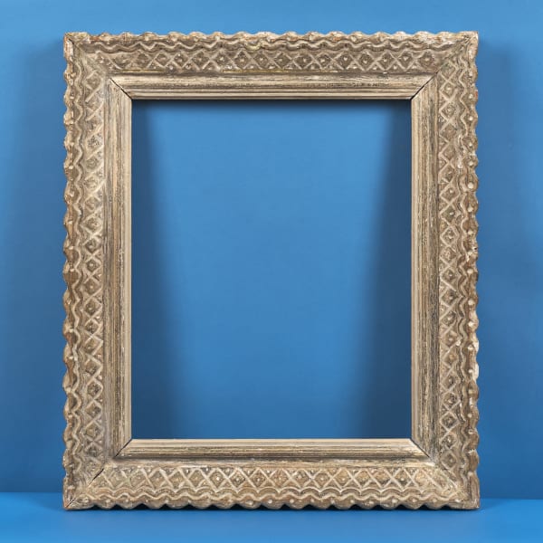 French Bouche frame, 20th century chip carved gesso and painted finish; typical Bouche surface pattern rebate size: 24.375 x 20.25 inches sight size: 23.625 x 19.5 inches width: 4.5 inches