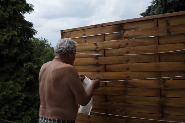 The Moment of Hanging a Cloth to Dry