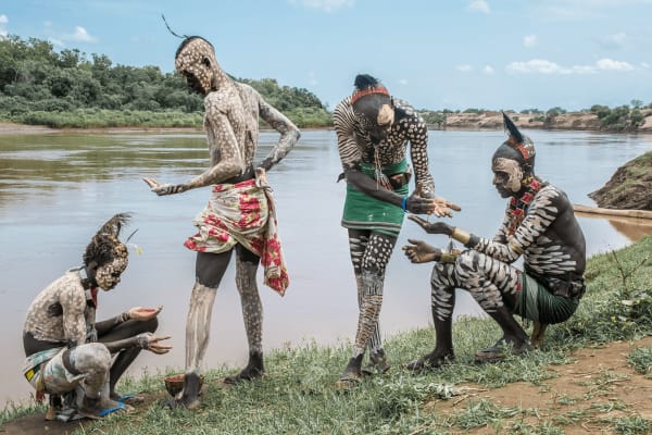 Carol Beckwith and Angela Fisher, Kara men preparing for courtship dances, Omo valley, Ethiopia, 2013