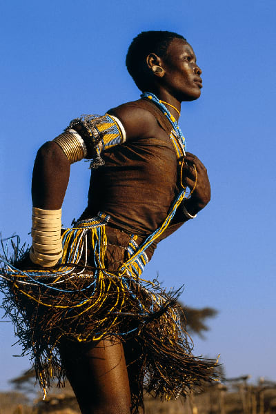 Carol Beckwith and Angela Fisher, Barabaig Woman Doing Crowned Crane Dance, Tanzania, 2003