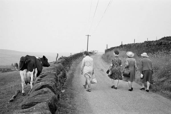 Martin Parr, Crimsworth Dean. Some of the congregation making their way to the Crimsworth Dean Chapel Anniversary, West Yorkshire, England, 1975