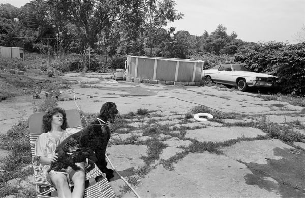 Sage Sohier, Woman lounging with Poodles, Somerville, Massachusetts, 1981