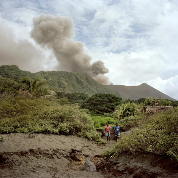 Jon Tonks, Two Girls at Sulphur Bay, with Mount Yasur behind, Tanna, Vanuatu, 2017