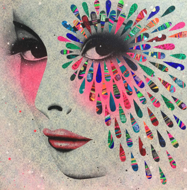 Collage on canvas with vintage decorative papers and stamps, spray paint and gold leaf by Roo Abrook titled Dream in Colour (2022), depicting a female profile, striking eyes looking out the viewer, the prominent is surrounded by a rays of colourful collaged teardrop shaped vintage stamp cut outs which gives the portrait a surrealist quality. Turner Art Perspective, Essex Gallery.