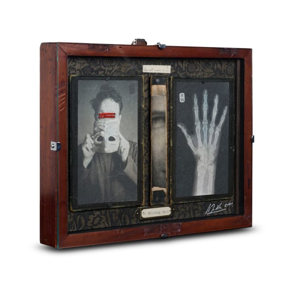 Vintage wooden story box, photographed x-ray hand