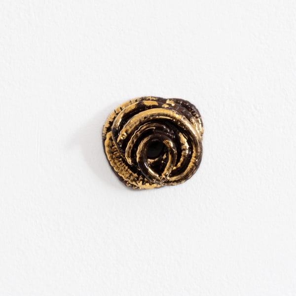 Karen Densham Cast, 2024 Ceramic and gold lustre (individually made) 5.5 (dia) x 2 cm Edition of 100