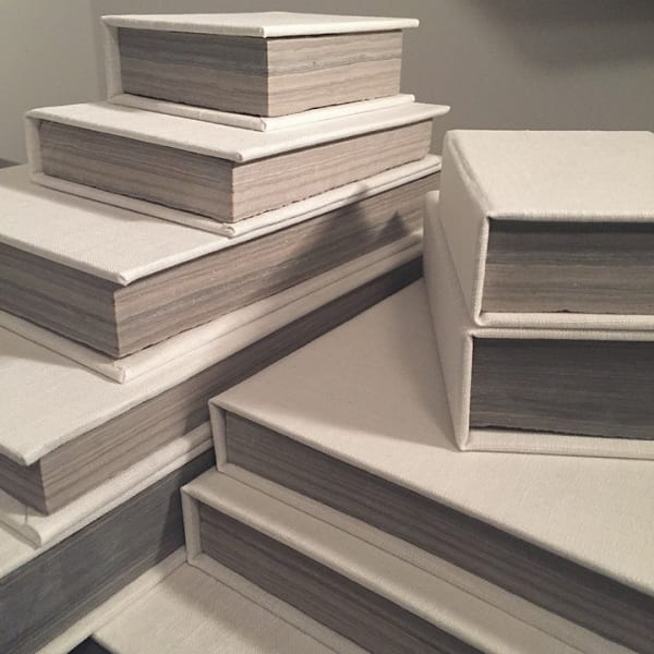 Stone Books, 2017 Variable (12 individual sculptural works) Meghan Price Limestone, book board, linen, graphite on paper