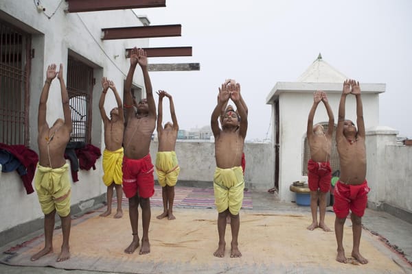 Briana Blasko, Ashtanga Yoga Students practicing Surya Namaskara International Chandramauli Charitable Trust, Varanasi, 2016