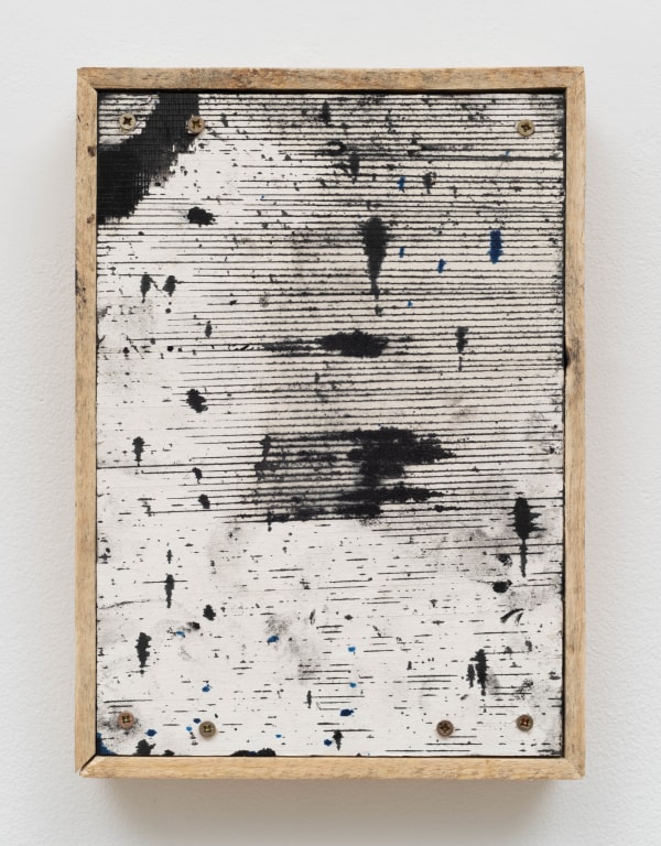 thin cuts of paper with ink mounted