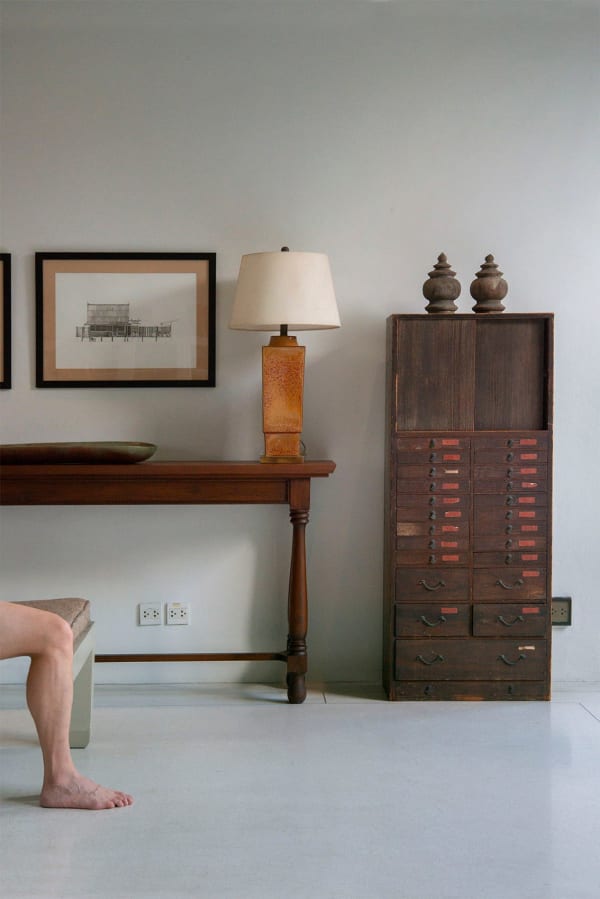 Old Oriental apothecary cabinet, Art, large pair of wood finials in the shape of covered urns. Siri Sala Private Thai Villa