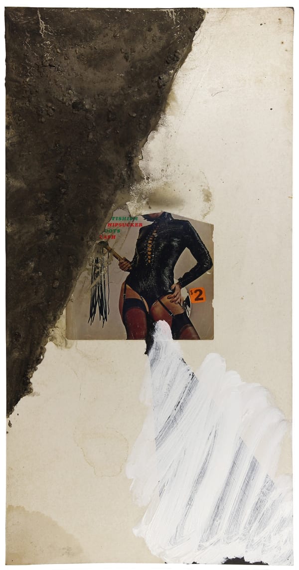 Paper collage with sand over a photograph of a woman in black fetish clothing holding a flogger, white background