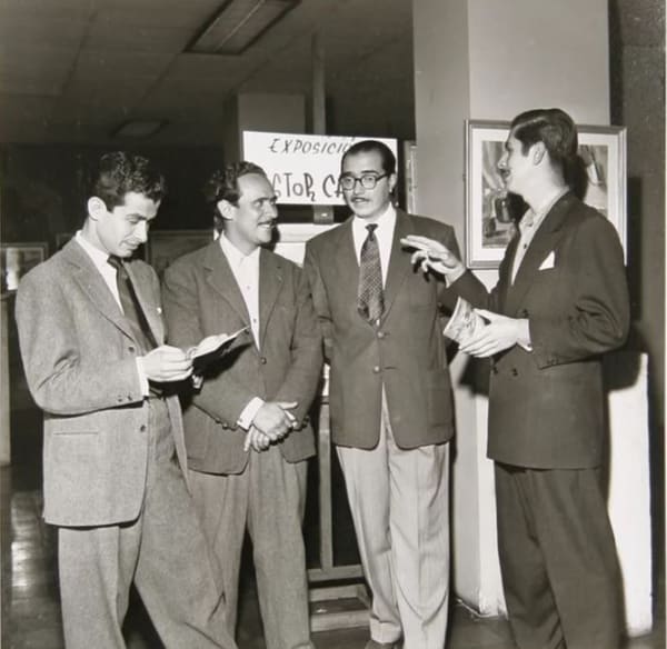 Black and white photograph of Leo Matiz speaking with artist Fernando Botero and politicians Carpena and Arboleda