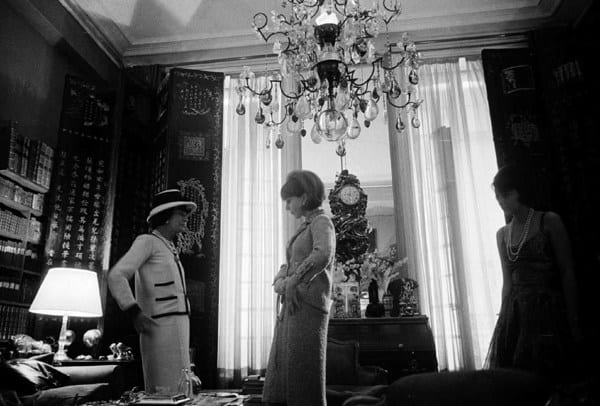 Black and white photograph of Designer Coco Chanel in her private apartment at the House of Chanel