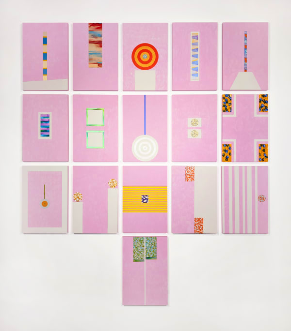 An array of colorful paintings comprised of geometric abstract forms displayed on a white wall