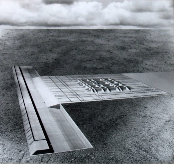 Black and white photomontage of a flat landscape with a three dimensional structure in the form of raised grid lines, viewed from above and at a great distance