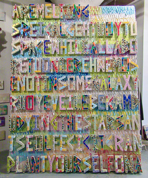Multidimensional painting comprising an array of colorful letters