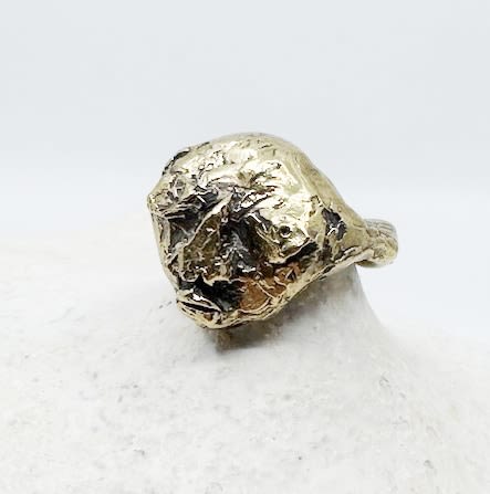 Golden face ring