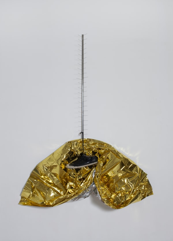 Bruna Esposito Tramonto, 2014 Rescue blanket, pigeons deterrent, shoe 165 x 134 cm 65 x 52 3/4 in