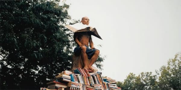 Zhang Huan, My Boston IV (man on books), 2005