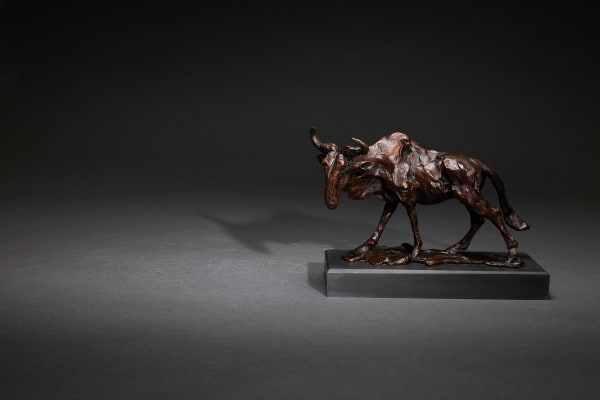 Jane Shaw IN THE MIDDAY SUN (WALKING WILDEBEEST) Bronze 7 1/2 x 10 5/8 x 4 in 19 x 27 x 10 cm 1/12