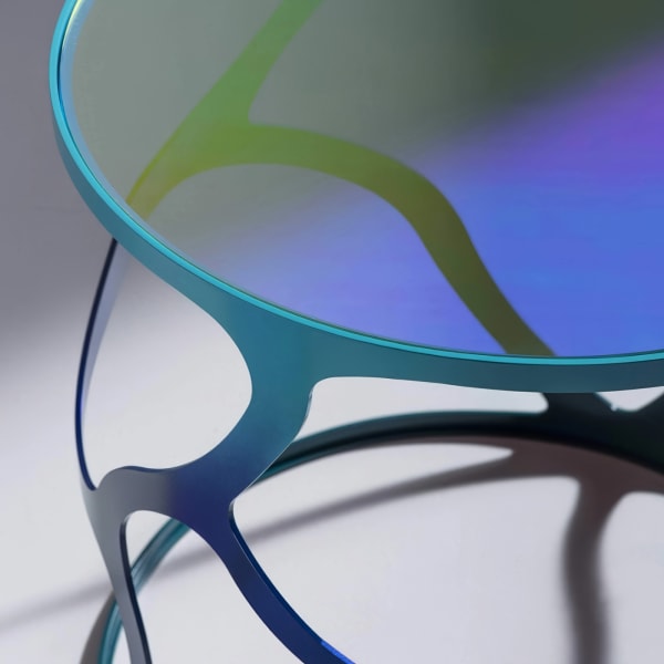 Tom Faulkner Papillon Side Tables • Base: Steel or Bronze • Top: Glass (clear or dichroic), or Marble • Available in a choice of finishes Size: Small Height: 50 cm / 19.7 in, Diameter: 50 cm / 19.7 in Size: Large Height: 60 cm / 23.6 in, Diameter: 60 cm / 23.6 in Lead Time: 10 Weeks