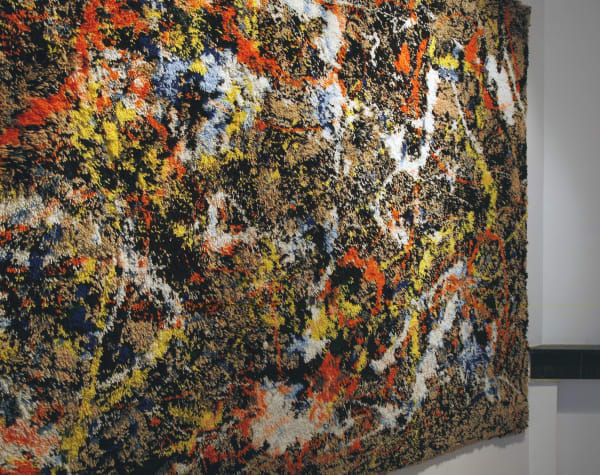 Diffracted solstice: exhibition view / Aeroplastics @ Rue Blanche Str., Brussels. Ph: Vincent Everarts / detail of the work by Kurt Treeby (tapestry), reproduction of "Conversion" by Jackson Pollock