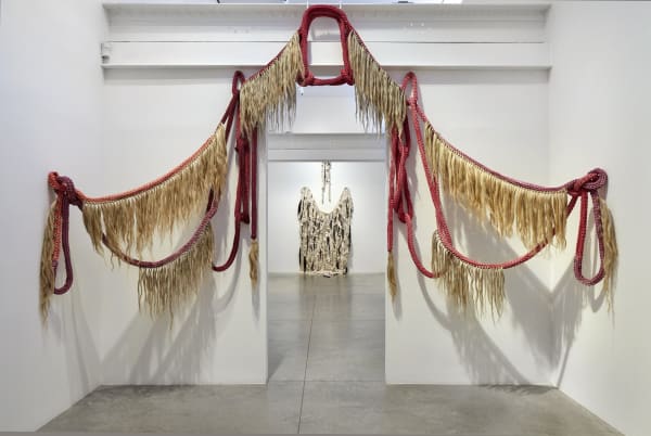 Tanya Aguiñiga, Alcyoneus, 2025. Cochinilla-dyed cotton rope and heckled flax. Dimensions as installed: 143 x 157 x 44 inches. Courtesy of the artists and albertz benda NY | LA. Photo: Thomas Muller.