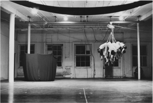 Sylvia Palacios Whitman, Slingshot, 1975 (performance view, Evening, Idea Warehouse, 1975), gelatin silver print, 25 × 20 cm. Courtesy Sylvia Palacios Whitman Archive