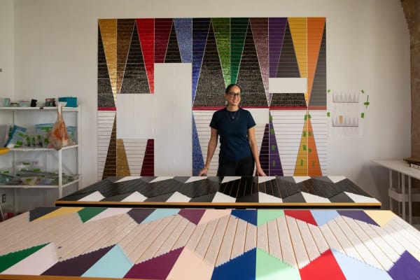 2023 MacArthur fellow Dyani White Hawk with her beaded artworks. White Hawk was one of three Minnesotans awarded Guggenheim Fellowships Thursday. Courtesy of John D. and Catherine T. MacArthur Foundation